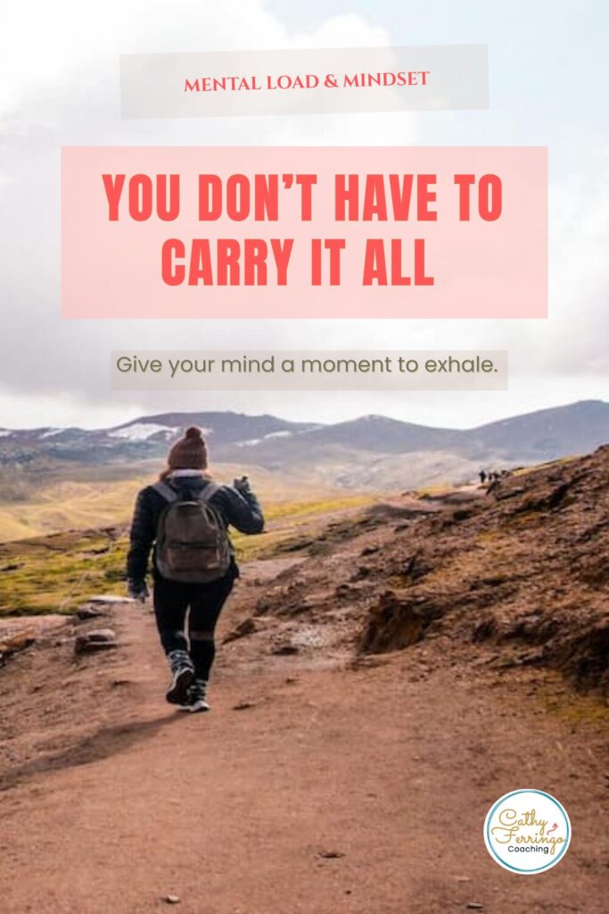 A person walking along a mountain trail with a backpack, symbolizing the invisible burdens we all carry and the freedom that comes when we set them down to lighten our mental load.